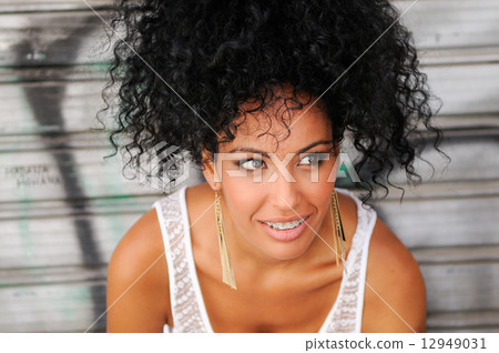 Young black woman smiling with braces 12949031