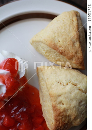 Homemade scones with fresh cream and homemade strawberry sauce 12951768