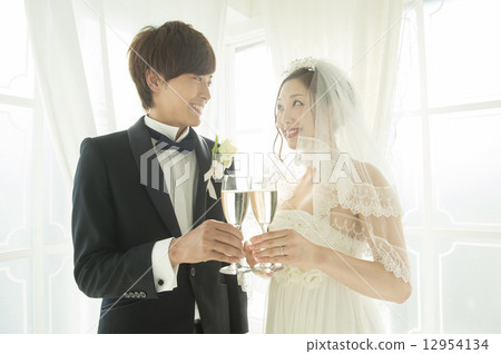 A bride and grooming toast 12954134