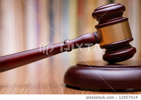 Close up Wooden Law Gavel on the Table Close up Wooden Law Gavel on the Table 12957414