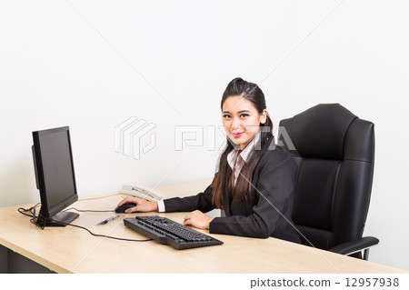 Corporate business women at her office Corporate business women at her office 12957938