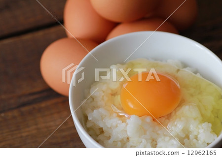 Fresh brown eggs and rice with raw egg Fresh brown eggs and rice with raw egg 12962165