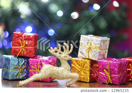 Reindeer's ornaments and gifts indoors 12965235