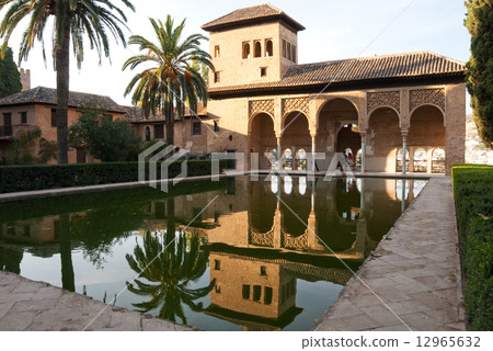 The Partal gardens of Alhambra in Granada, Spain The Partal gardens of Alhambra in Granada, Spain 12965632