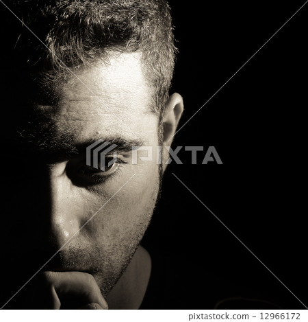 Serius man on black background Serius man on black background 12966172