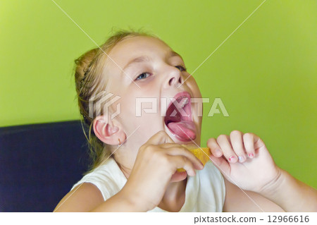 Cute girl eating melon Cute girl eating melon 12966616