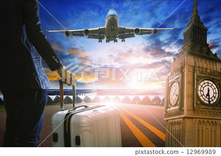 business man and luggage standing in airport and passenger jet p 12969989