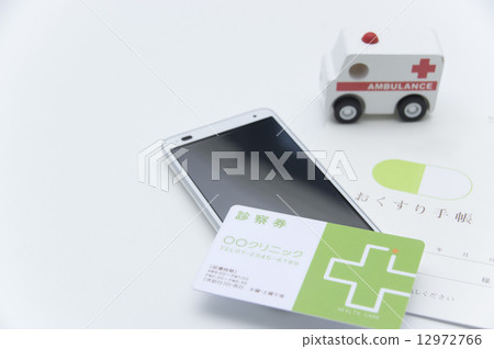 Medical examination ticket and copy book and smartphone medical image Medical examination ticket and copy book and smartphone medical image 12972766