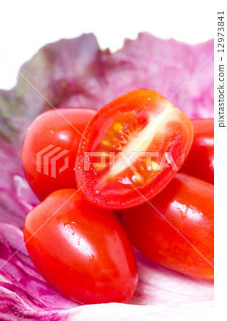 Cherry Tomatoes with Radicchio leaf. 12973841