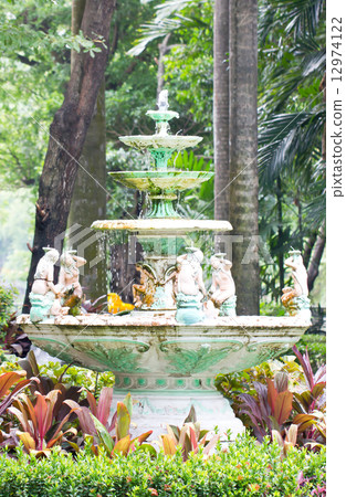 Old and dirty fountain in public park. 12974122