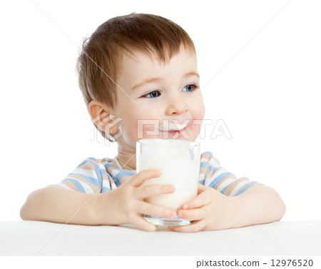 child drinking milk from glass 12976520