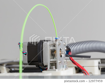 3d printer with bright green filament 3d printer with bright green filament 12977459