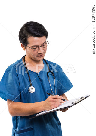 Surgeon writing a report 12977869