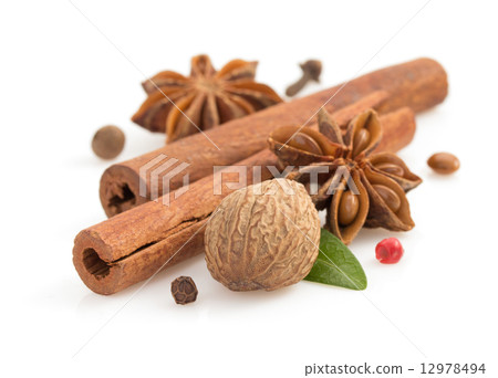 cinnamon sticks, anise star and spices on white 12978494