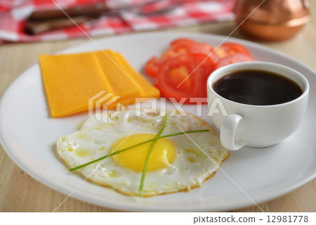 Breakfast with egg and coffee Breakfast with egg and coffee 12981778