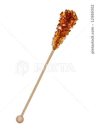 Brown sugar crystal on stick Brown sugar crystal on stick 12989302