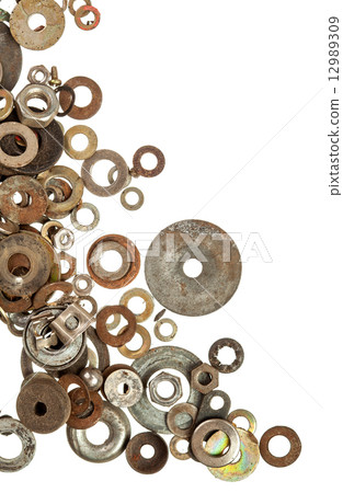 Old rusty washers over white background 12989309