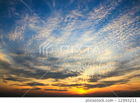 Dramatic sunset sky with clouds Dramatic sunset sky with clouds 12993211