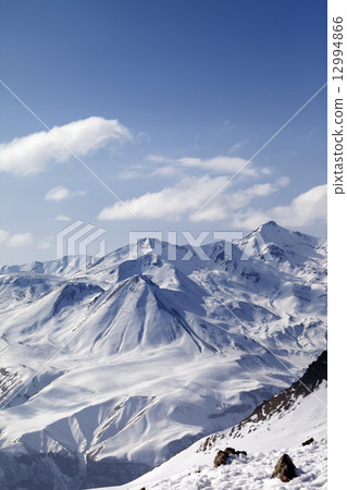 Snowy mountains in nice sun day Snowy mountains in nice sun day 12994866