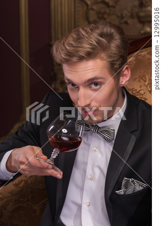 Handsome man with cigar 12995016
