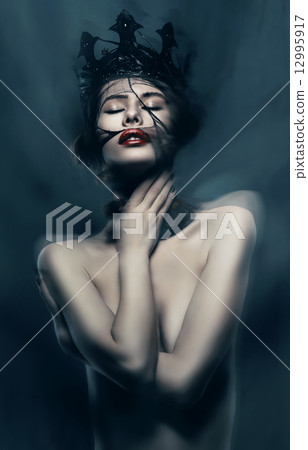 dynamic sexy woman in black crown 12995917