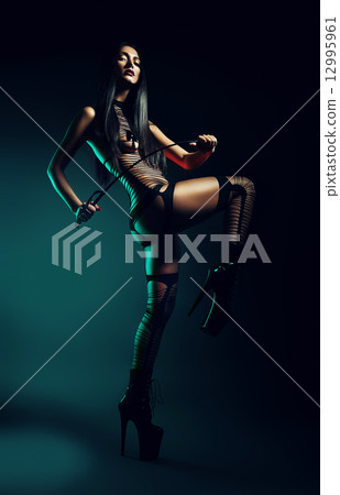 sexy woman in striped body with whip sexy woman in striped body with whip 12995961