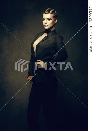 old-fashioned woman in blazer old-fashioned woman in blazer 12995964