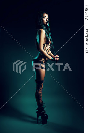 bdsm woman in black wear 12995965