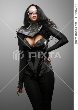 Fatal woman in stylish dress 12996256