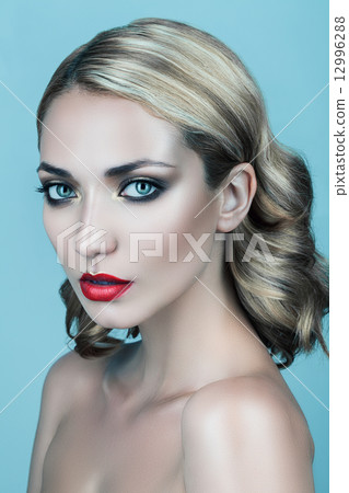 blond woman with red lips and curly hair blond woman with red lips and curly hair 12996288