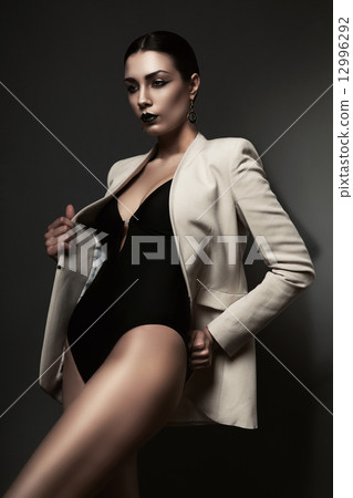 woman with black lips and black body woman with black lips and black body 12996292