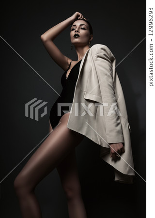 sexy woman in white blazer and black body sexy woman in white blazer and black body 12996293