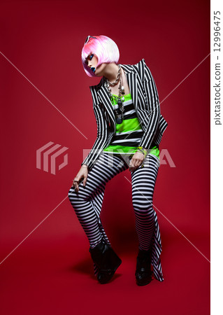 Woman with pink hair 12996475