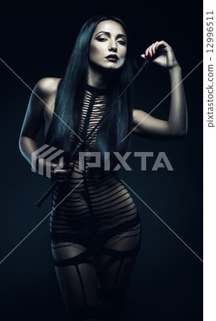 woman with whip woman with whip 12996511