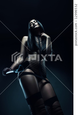 woman with black whip woman with black whip 12996532