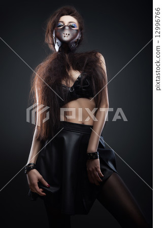 woman in leather clothing woman in leather clothing 12996766