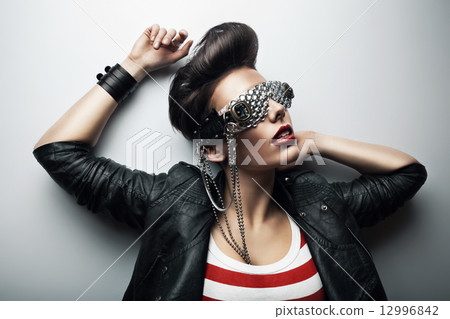 pretty woman in black leather jacket 12996842