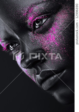 woman in silver paint and neon pink powder 12996890