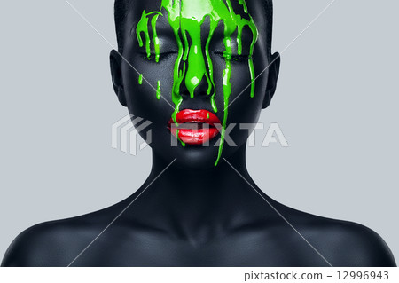 woman with flowing green paint woman with flowing green paint 12996943