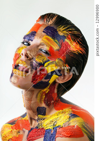 sexy woman with bodyart on face sexy woman with bodyart on face 12996980