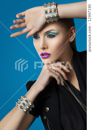 Portrait of woman with bracelets Portrait of woman with bracelets 12997190