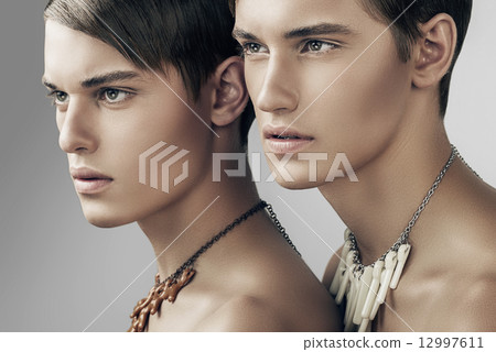 handsome adult men in necklaces 12997611