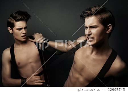 two fighting men in suspenders 12997745