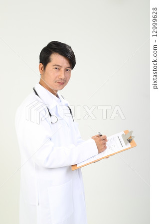 Male Doctor Writing Report on Clipboard Side faceing forward Male Doctor Writing Report on Clipboard Side faceing forward 12999628