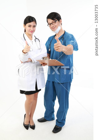 Male and female doctor in uniform thums up Male and female doctor in uniform thums up 13003735