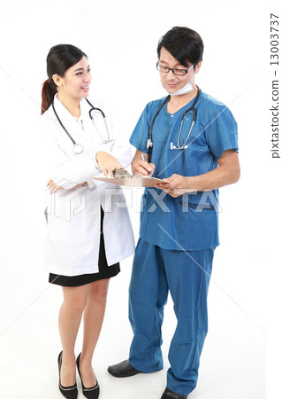 Male and female doctor in uniform point study report clipboard Male and female doctor in uniform point study report clipboard 13003737