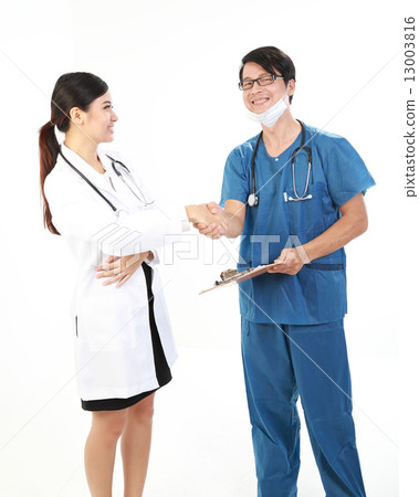Male and female doctor congratulate shaking hand Male and female doctor congratulate shaking hand 13003816