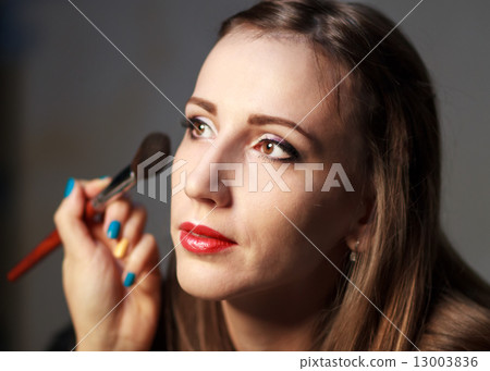 Professional makeup in studio. Professional makeup in studio. 13003836