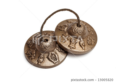 Tibetan Buddhist tingsha cymbals isolated Tibetan Buddhist tingsha cymbals isolated 13005820