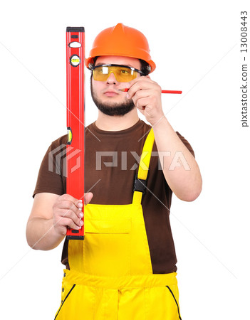 builder holding wasserwaage and pencil 13008443